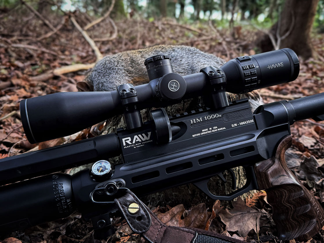 HM1000x on rock with walnut grip